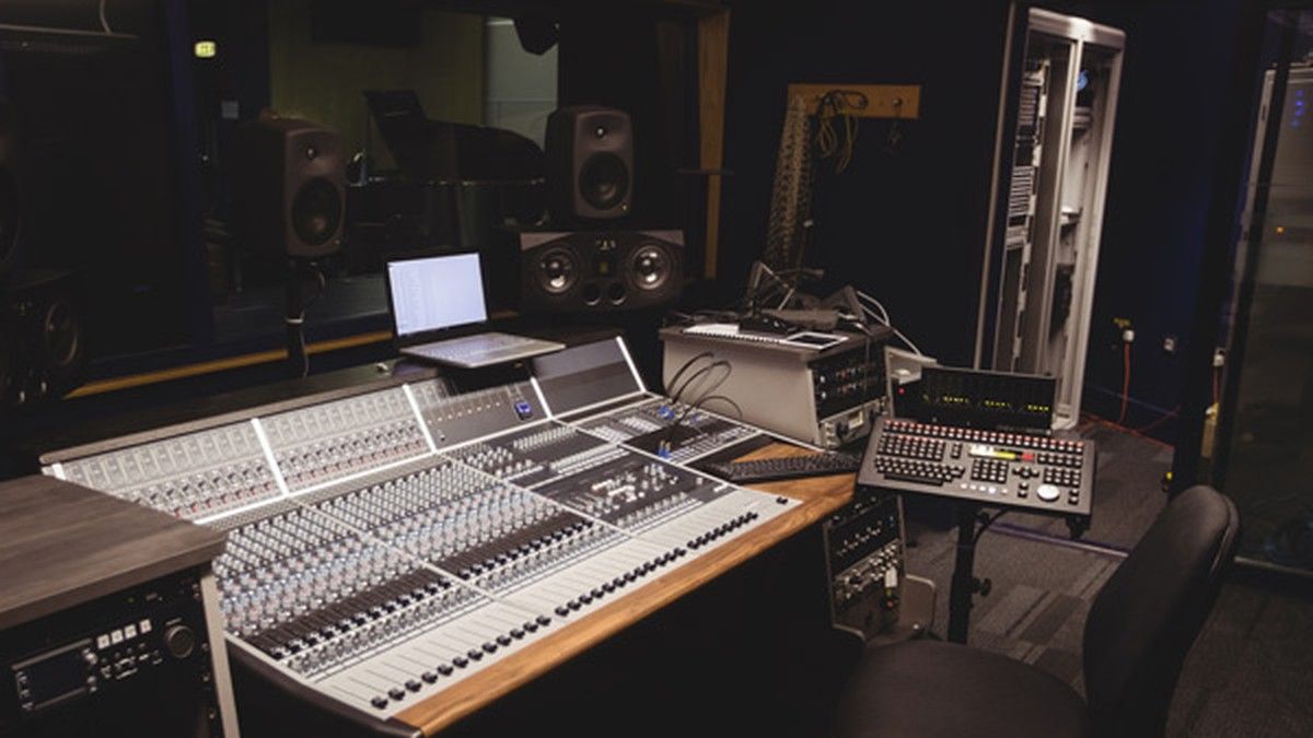 Mixing console and monitor speakers in a recording studio control room